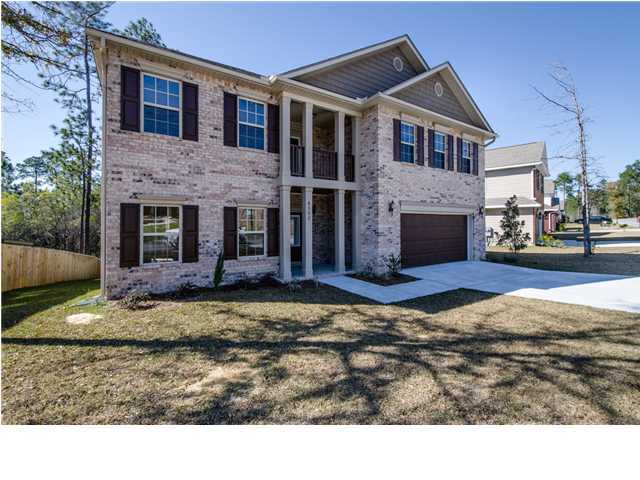 4560 Hermosa Road Crestview, FL 32539 - Photo 2 of 26 a view front of house with a yard