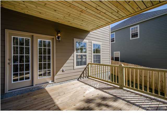 4560 Hermosa Road Crestview, FL 32539 - Photo 21 of 26 a view of a balcony with a wooden floor