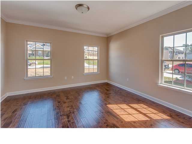 4560 Hermosa Road Crestview, FL 32539 - Photo 10 of 26 a room with window and wooden floor