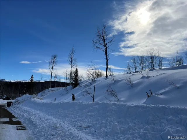 a view of a lake with a mountain in the background