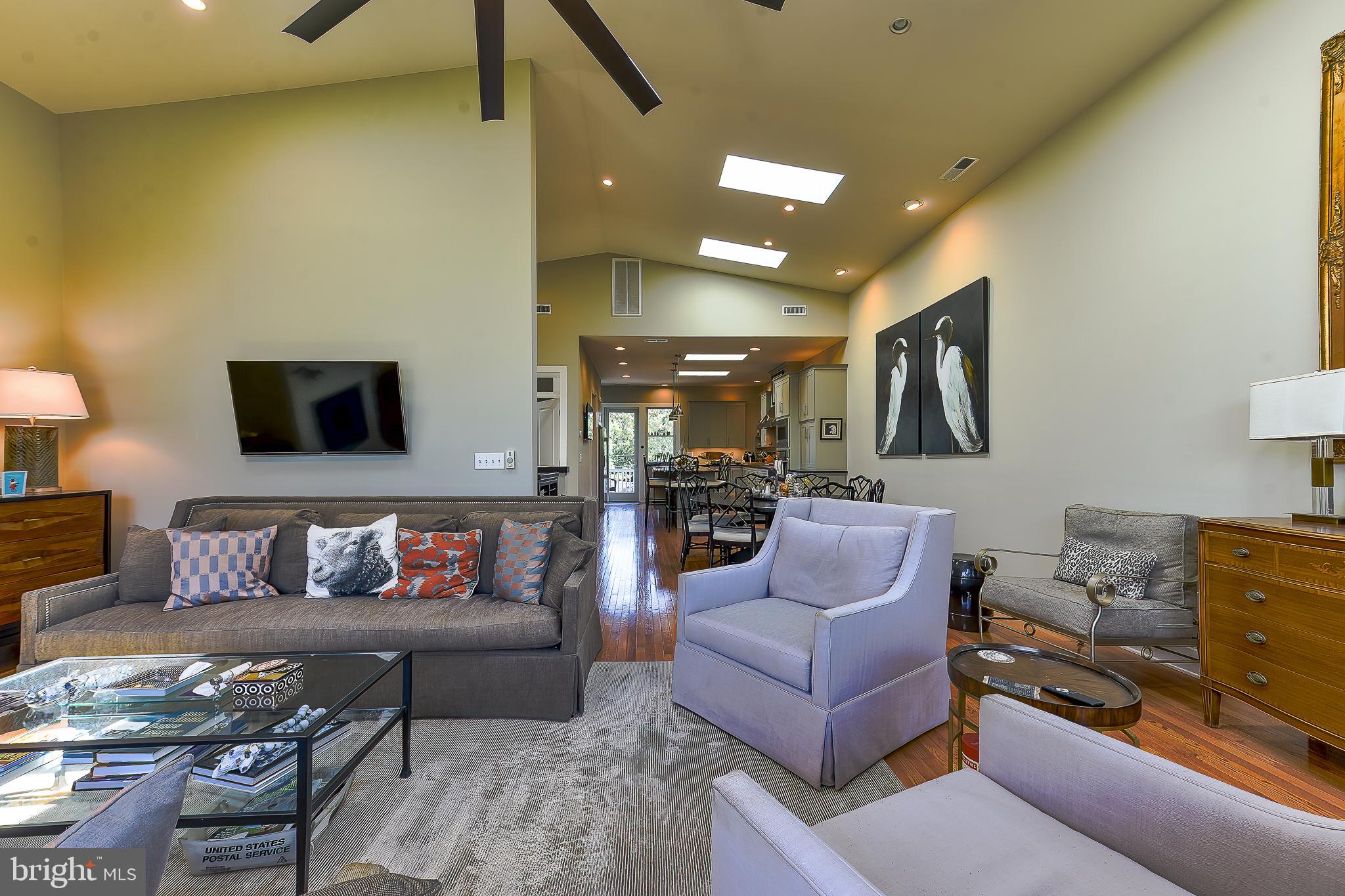 38520 Pine Lane, Unit 2 Rehoboth Beach, DE 19971 - Photo 11 of 71 a living room with furniture and a couch