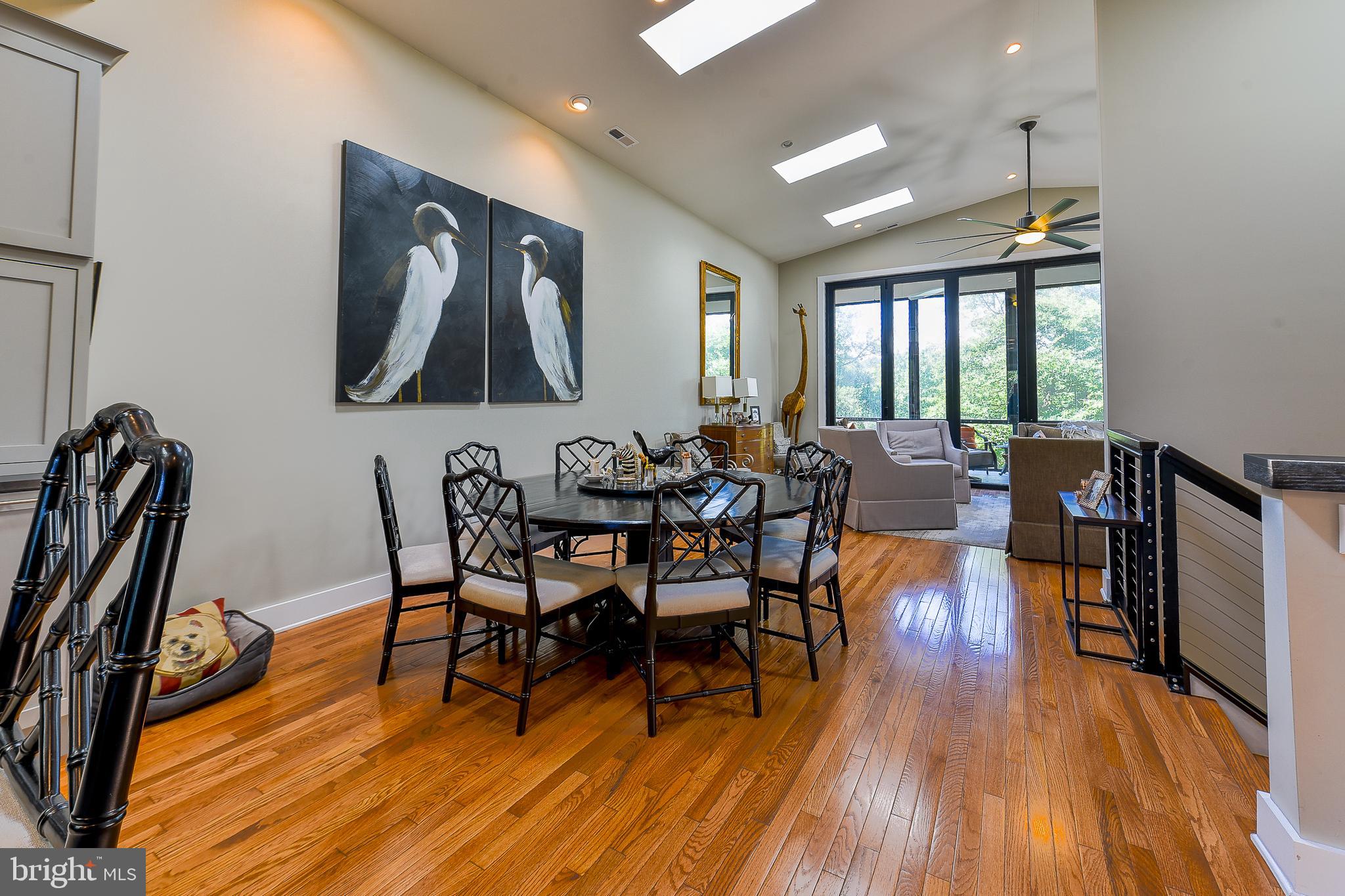 38520 Pine Lane, Unit 2 Rehoboth Beach, DE 19971 - Photo 22 of 71 a view of a dining room with furniture window and wooden floor