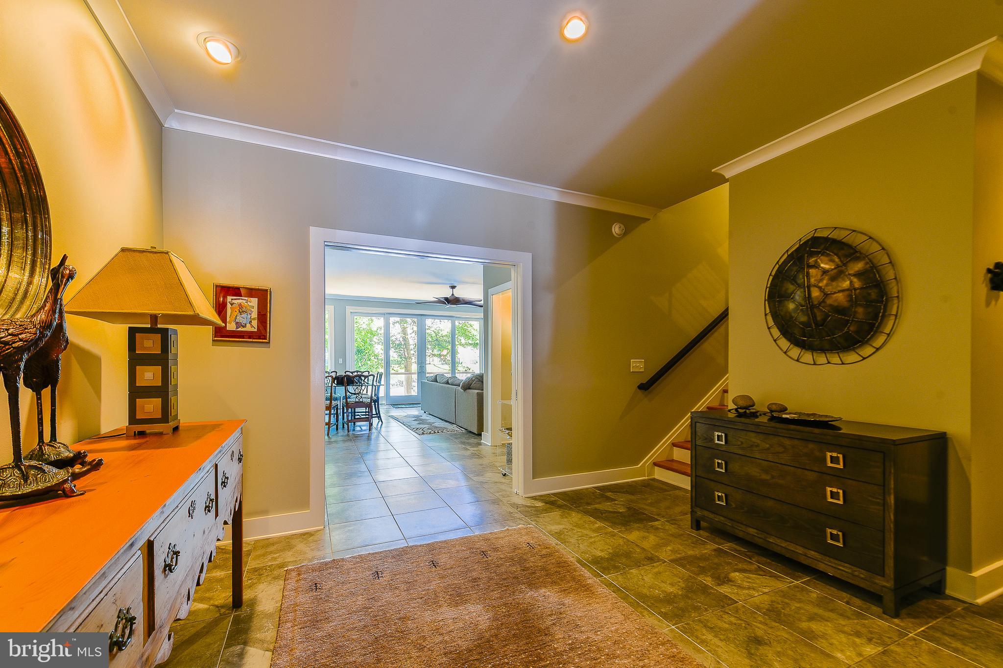 38520 Pine Lane, Unit 2 Rehoboth Beach, DE 19971 - Photo 49 of 71 a living room with furniture and a flat screen tv