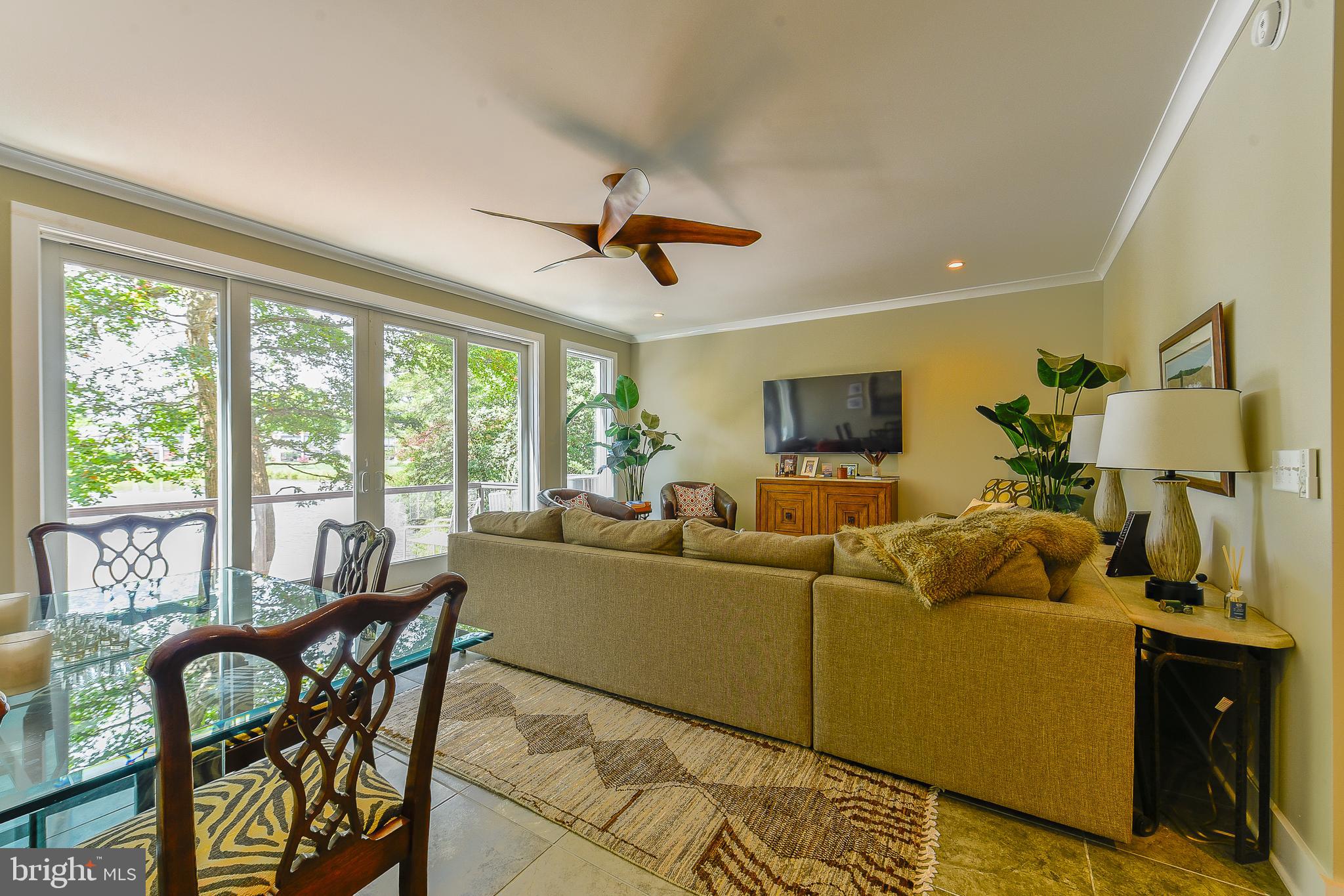 38520 Pine Lane, Unit 2 Rehoboth Beach, DE 19971 - Photo 53 of 71 a living room with furniture and a flat screen tv
