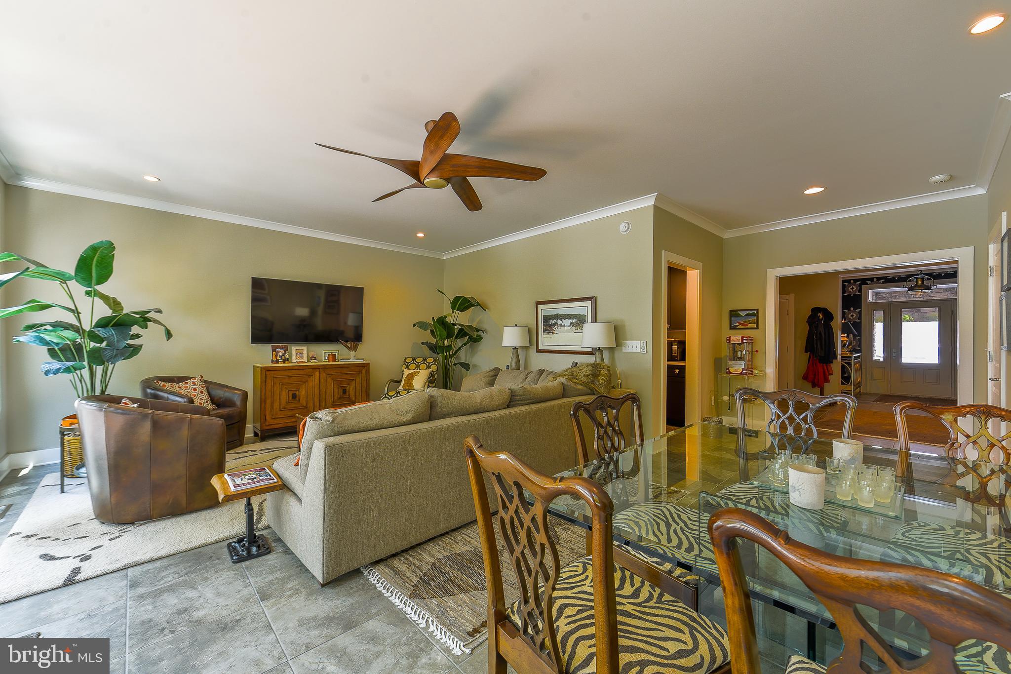 38520 Pine Lane, Unit 2 Rehoboth Beach, DE 19971 - Photo 54 of 71 a living room with furniture and a flat screen tv