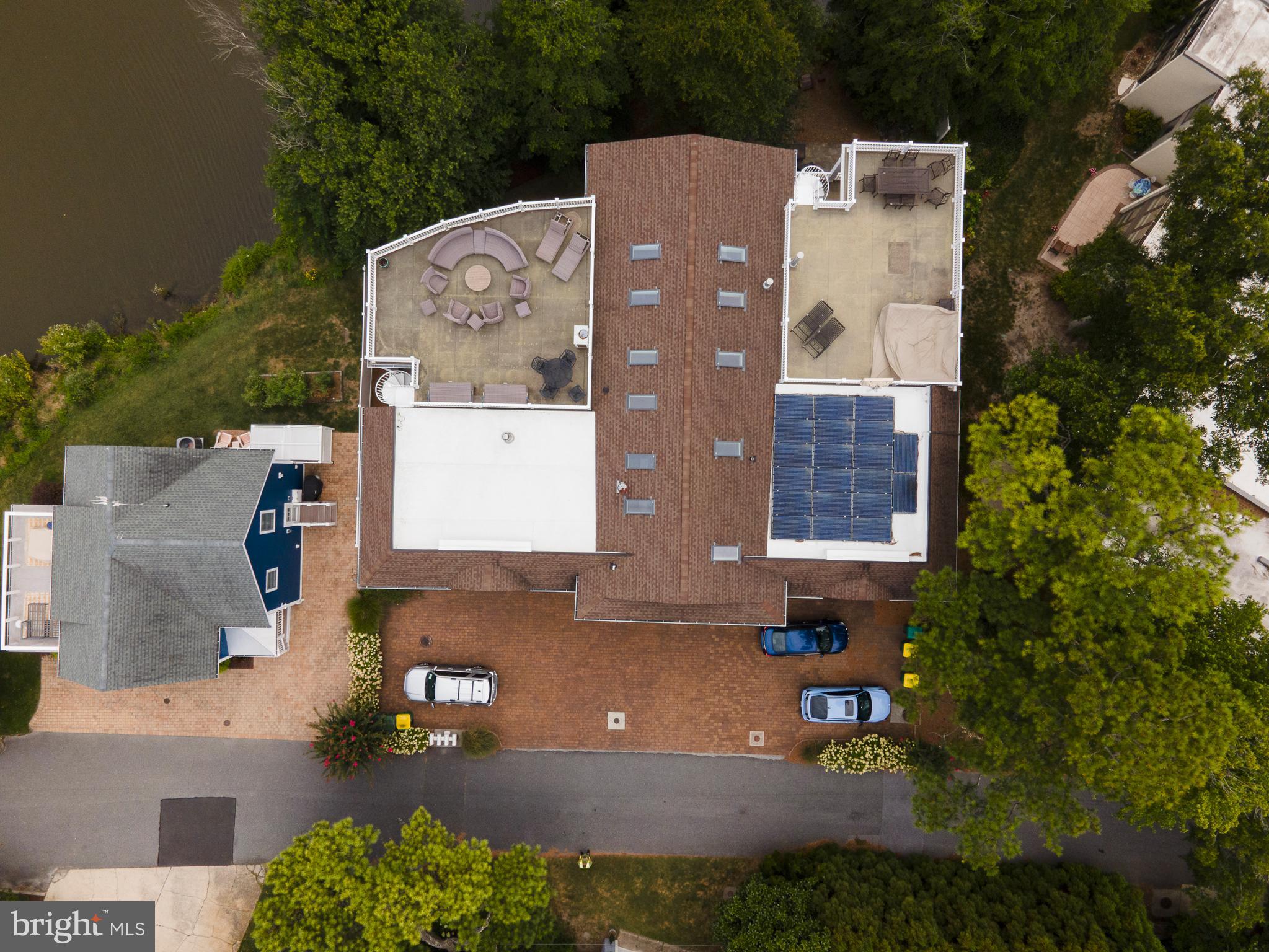 38520 Pine Lane, Unit 2 Rehoboth Beach, DE 19971 - Photo 68 of 71 an aerial view of a house with a yard and garden