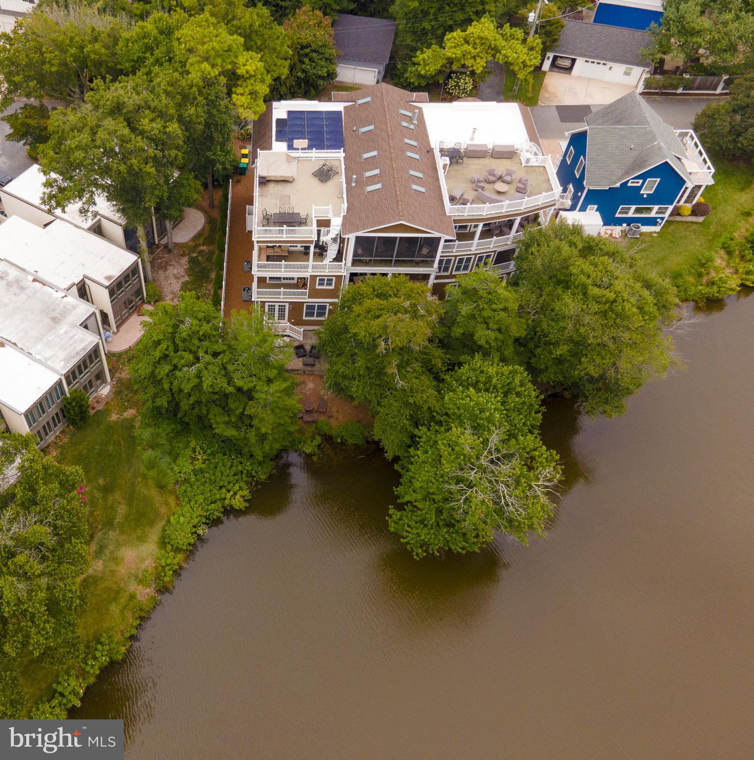 38520 Pine Lane, Unit 2 Rehoboth Beach, DE 19971 - Photo 70 of 71 an aerial view of a house with a yard and garden