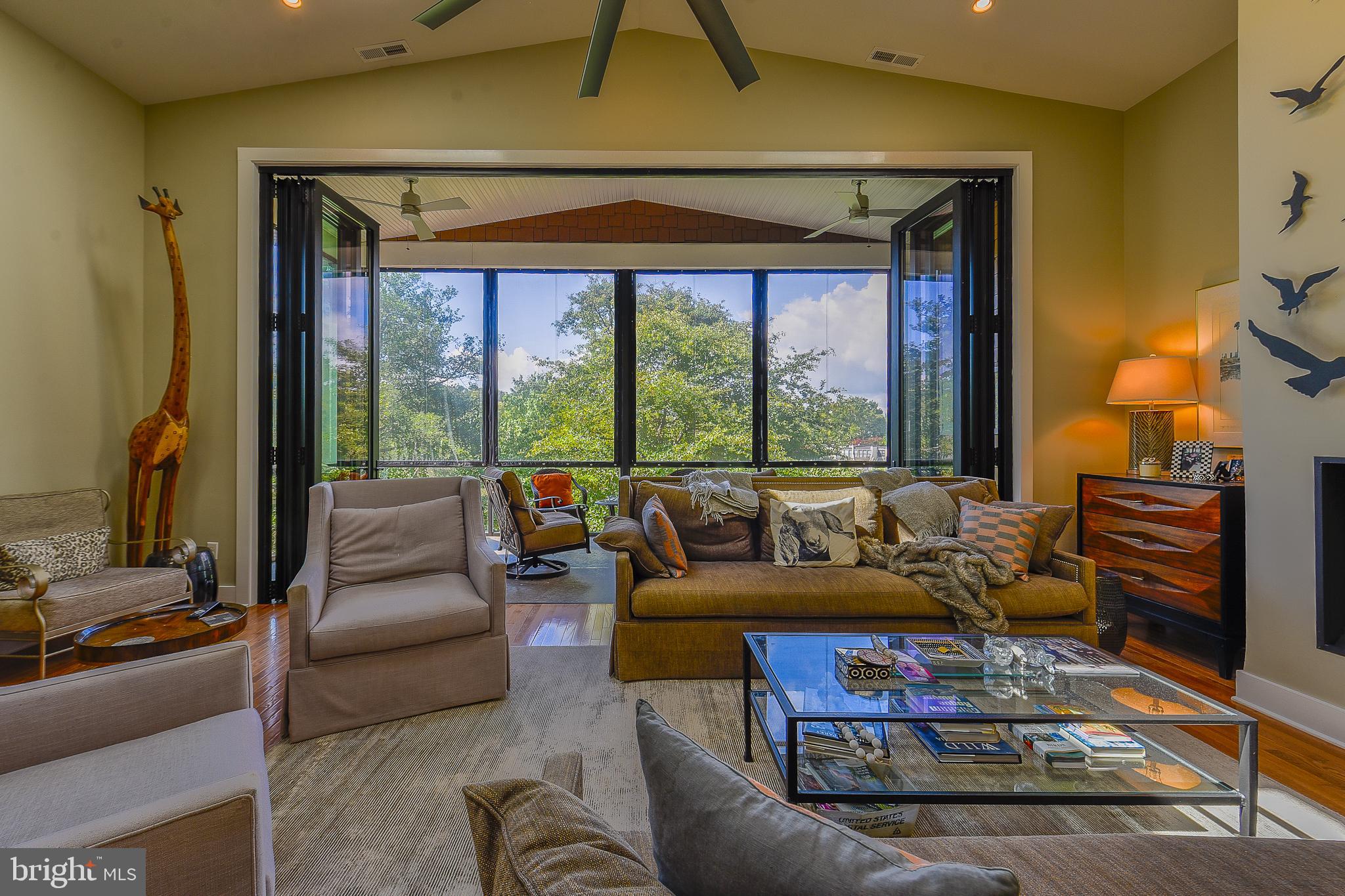 38520 Pine Lane, Unit 2 Rehoboth Beach, DE 19971 - Photo 8 of 71 a living room with furniture and a large window
