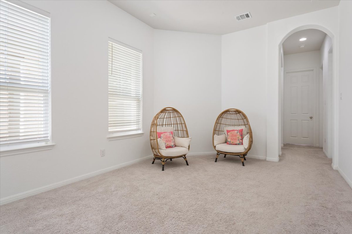 3625 Garrano Bend Leander, TX 78641 - Photo 19 of 38 This amazing space brings the three bedrooms in this wing of the home togther, for the perfect playspace.