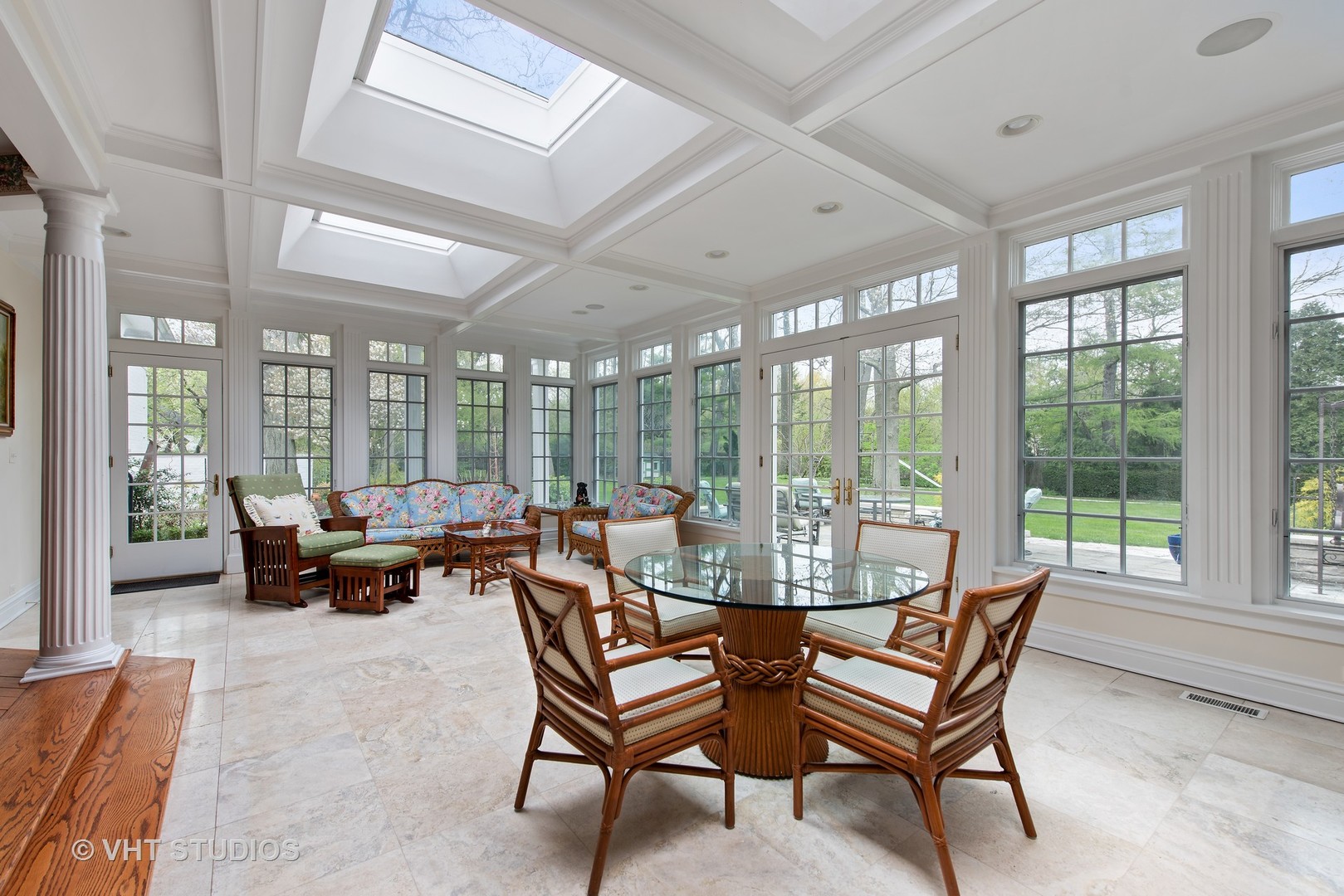 315 Woodley Road Winnetka, IL 60093 - Photo 6 of 28 a dining room with furniture and large windows