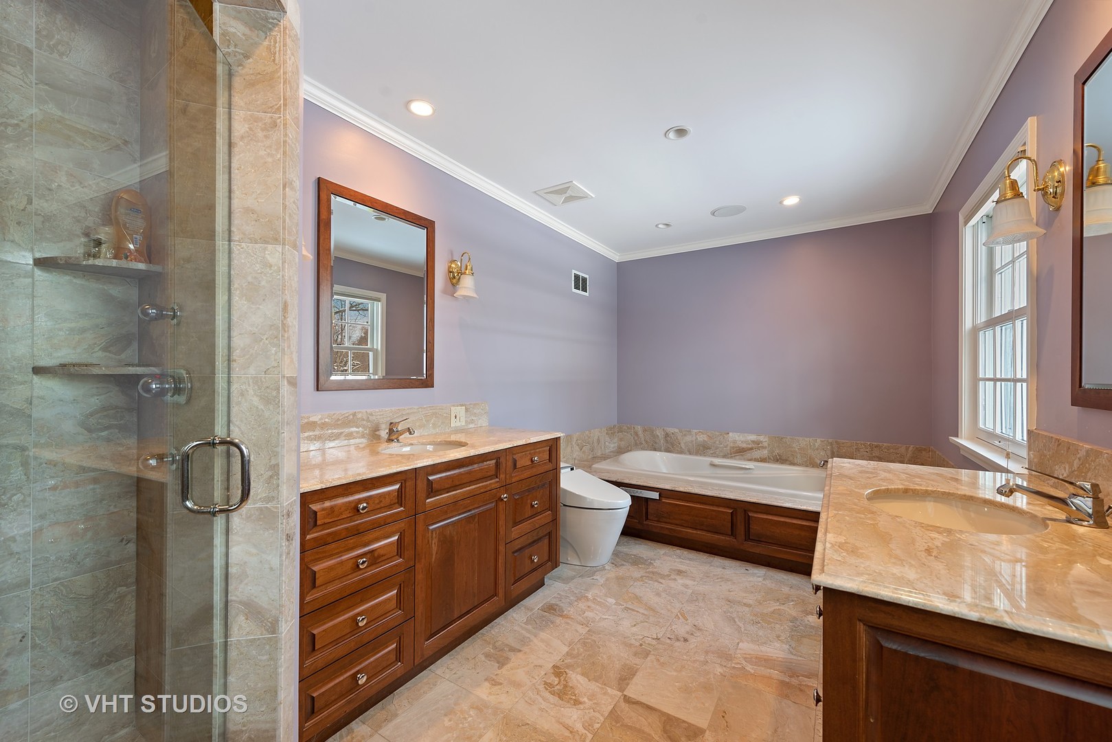 315 Woodley Road Winnetka, IL 60093 - Photo 9 of 28 a bathroom with a granite countertop tub sink and mirror