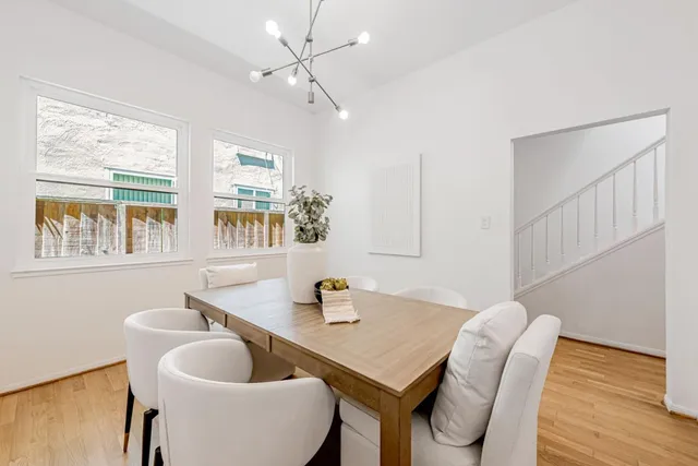 a bedroom with a bed a desk and chair