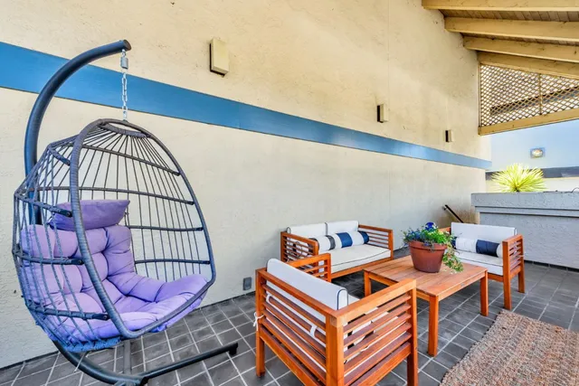 a outdoor living space with furniture and garden view