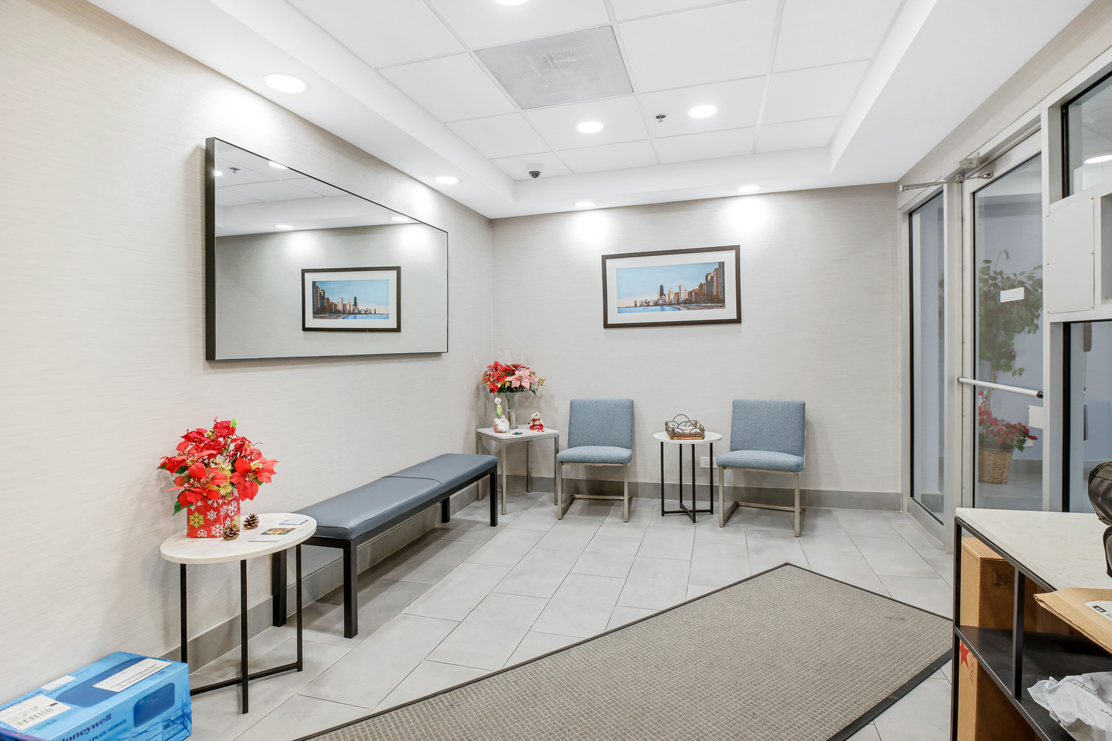 6400 West Berteau Avenue, Unit 405 Chicago, IL 60634 - Photo 19 of 22 a very nice looking room with furniture and wooden floor