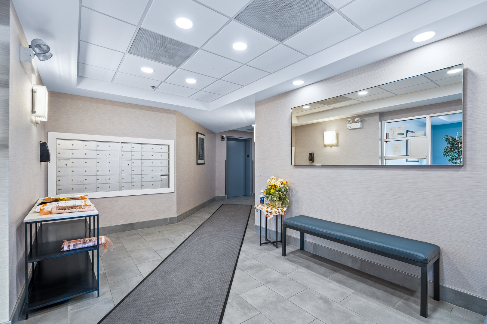 6400 West Berteau Avenue, Unit 405 Chicago, IL 60634 - Photo 20 of 22 a reading room with furniture and a window