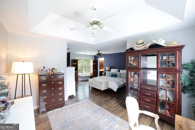 a bathroom with a double vanity sink mirror and shower