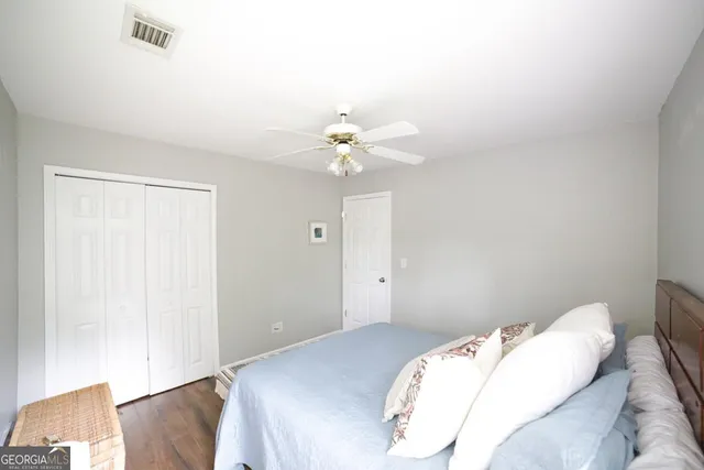 a bed room with a bed and a couch