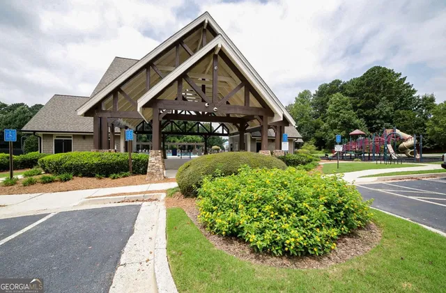 a view of a swimming pool with lounge chair