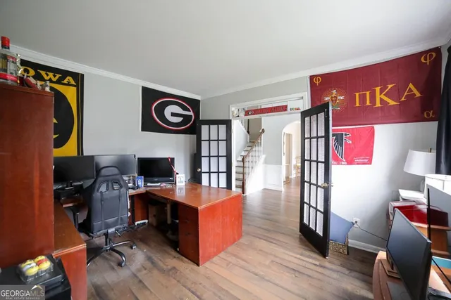 a living room with furniture fireplace and flat screen tv