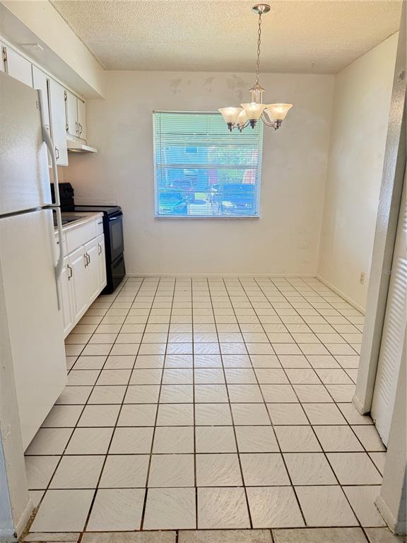 731 Michigan Court, Unit 1 St. Cloud, FL 34769 - Photo 7 of 18 a view of an empty room and window
