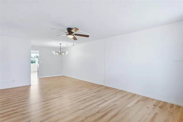 a kitchen with stainless steel appliances a refrigerator stove and microwave