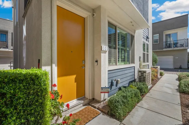 a front view of a house with a outdoor space