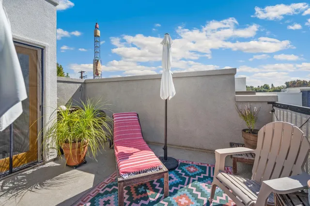 a view of balcony with patio