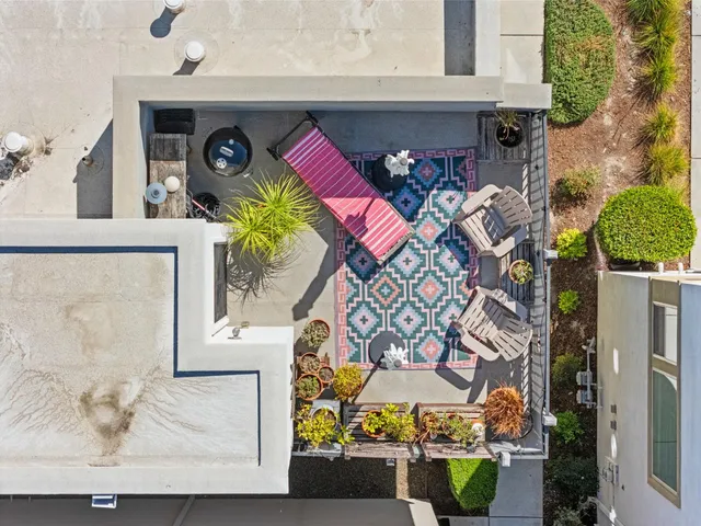 an aerial view of a house with a ocean view