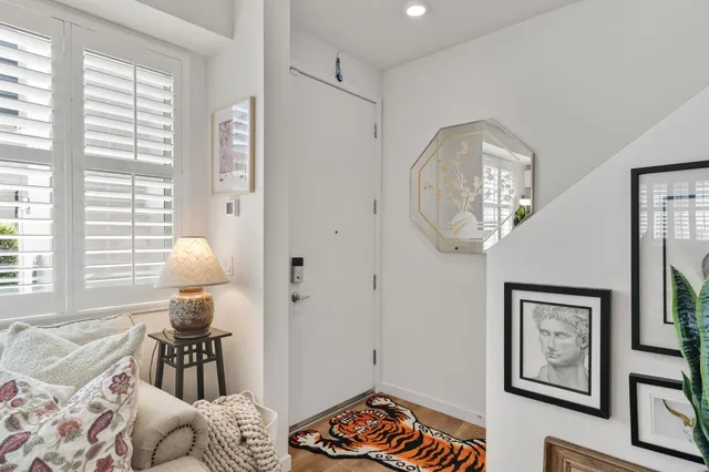 a bedroom with bed and a window