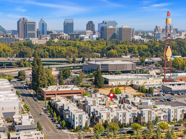 a view of a city with tall buildings