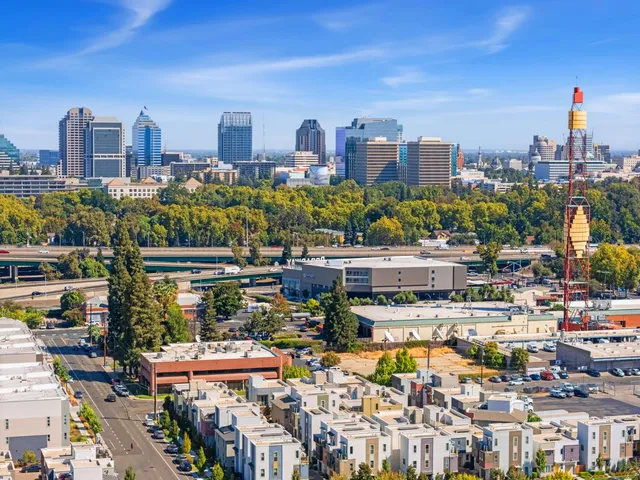 a view of a city with tall buildings