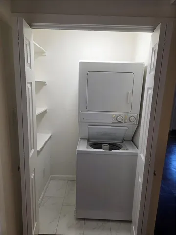 a utility room with a washer and dryer