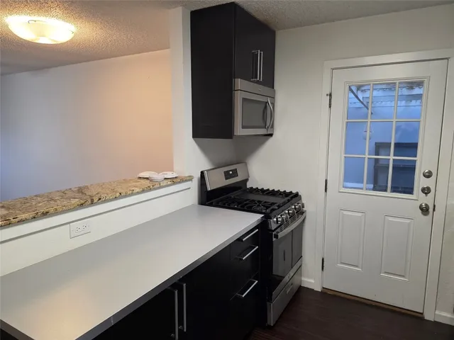a utility room with washer and dryer