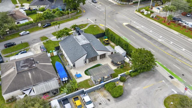 an aerial view of a house with a garden
