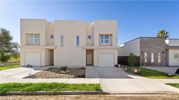 a front view of house with yard