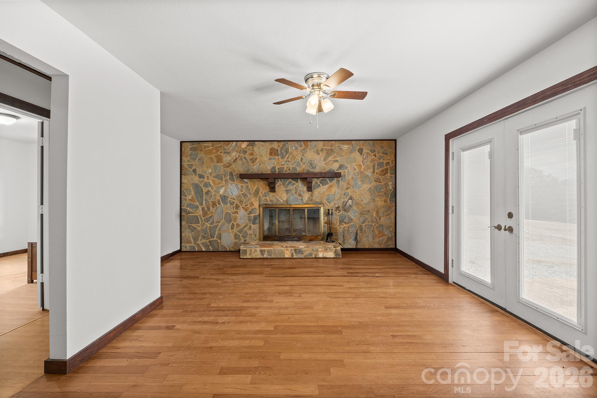 7400 Corn Hill Road Connelly Springs, NC 28612 - Photo 29 of 41 a view of an empty room with a fireplace