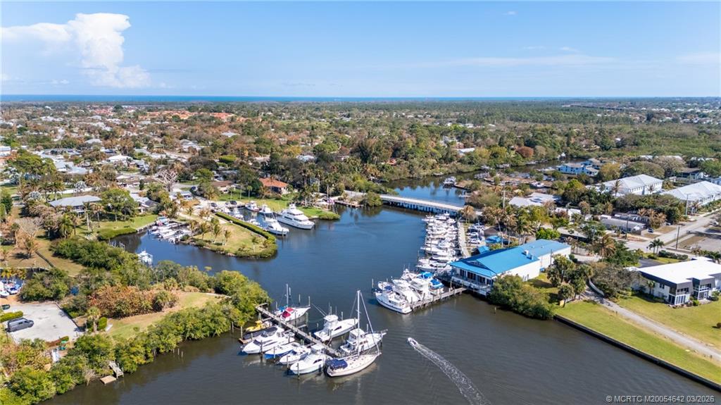 5169 Southeast Horseshoe Point Road Stuart, FL 34997 - Photo 51 of 54 an aerial view of a city with ocean view