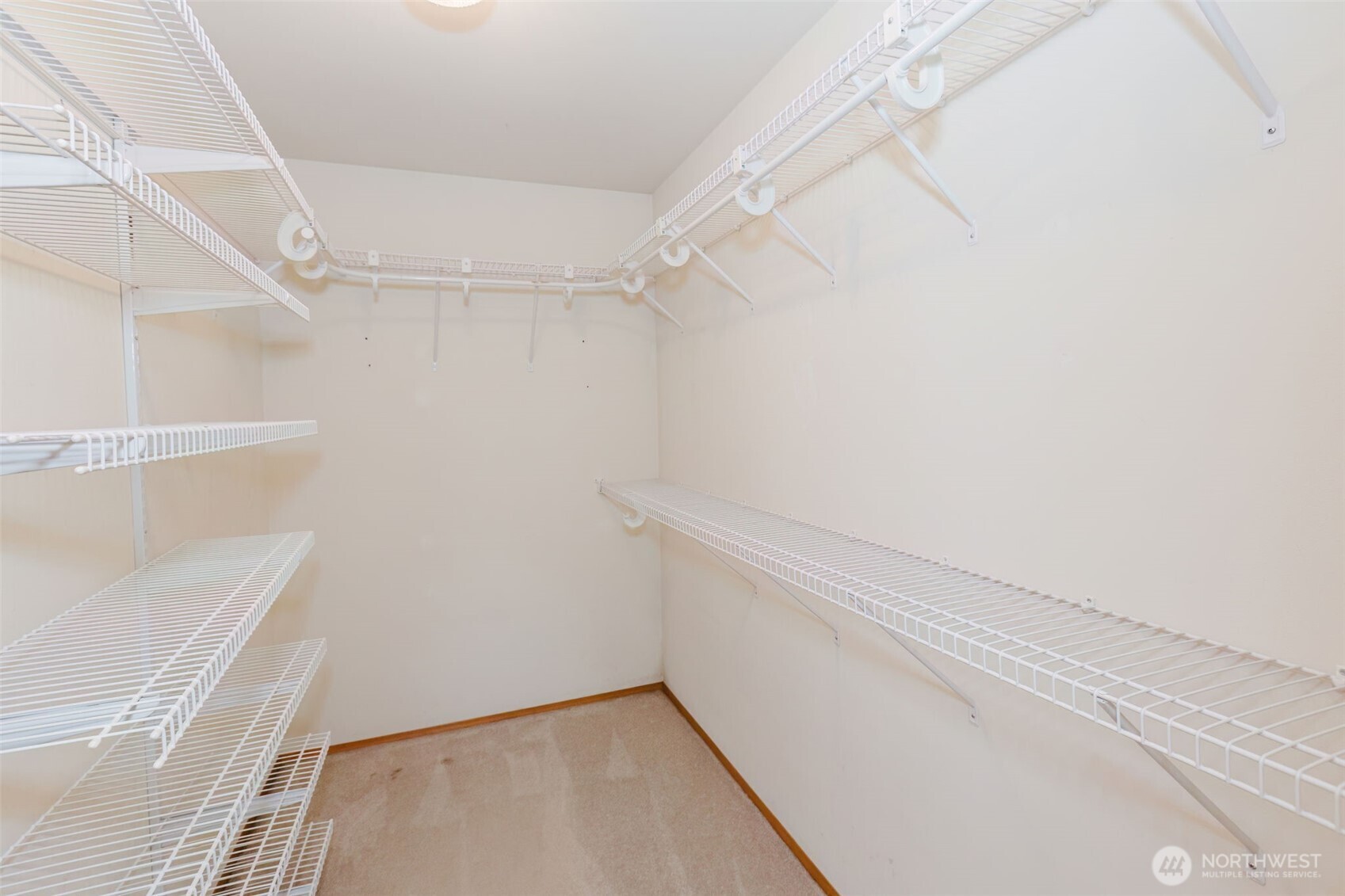 8911 Roanoke Road Northeast Bremerton, WA 98311 - Photo 22 of 40 a view of an empty walk in closet