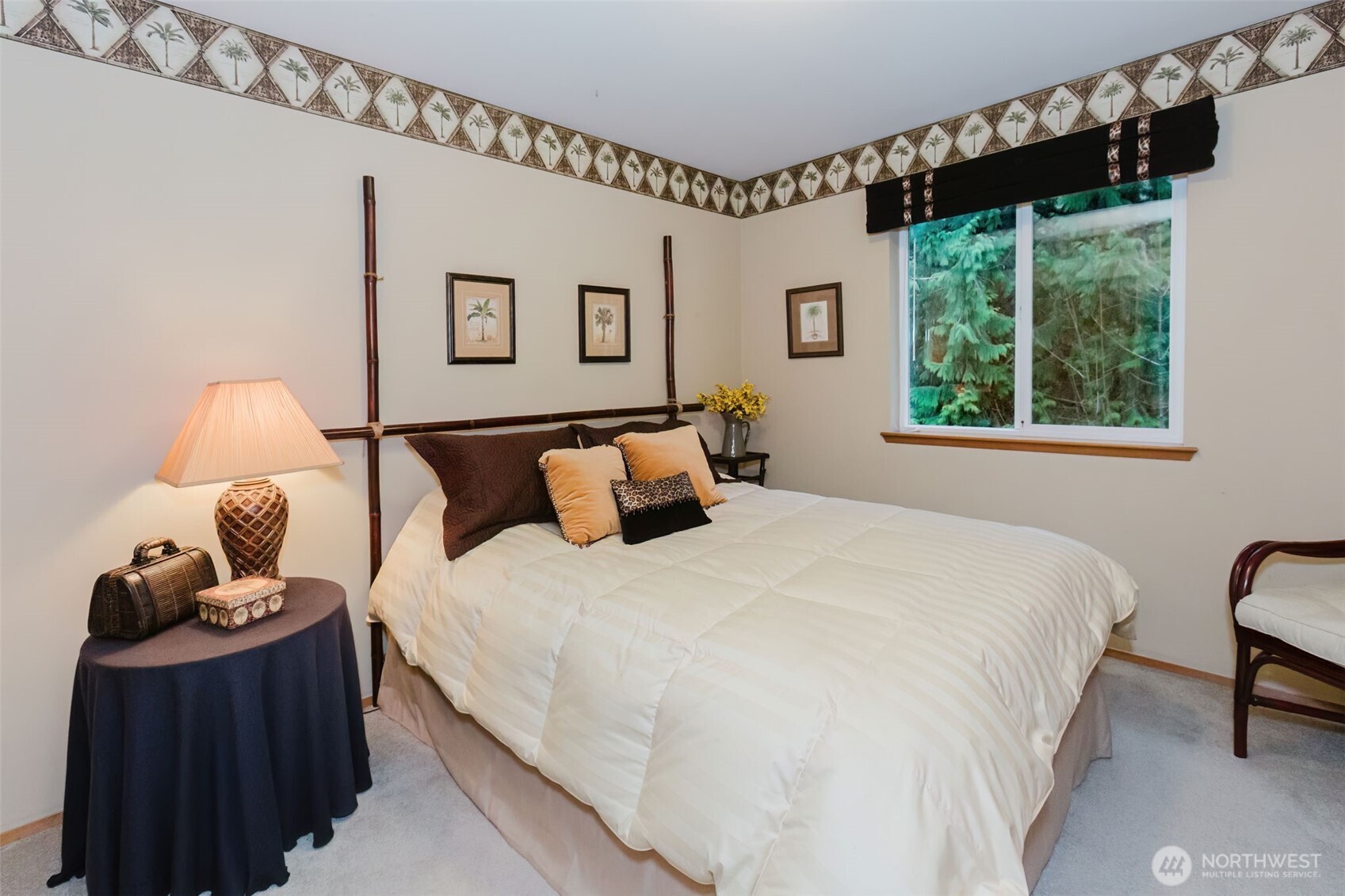 8911 Roanoke Road Northeast Bremerton, WA 98311 - Photo 23 of 40 a bedroom with bed and window