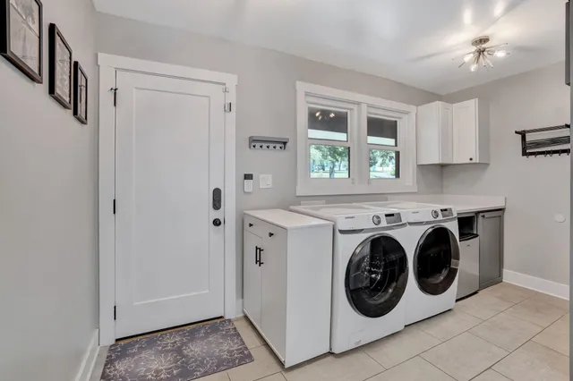 a bathroom with a sink toilet and mirror