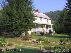 750 Rice Cove Road Canton, NC 28716 - Photo 1 of 9 a view of house with garden