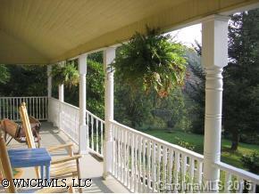 750 Rice Cove Road Canton, NC 28716 - Photo 4 of 9 a view of a two chair in the balcony
