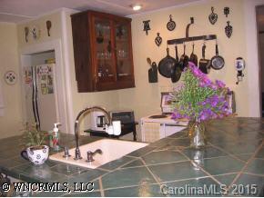 750 Rice Cove Road Canton, NC 28716 - Photo 9 of 9 a bathroom with a sink and a mirror