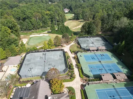 an aerial view of a house with outdoor space