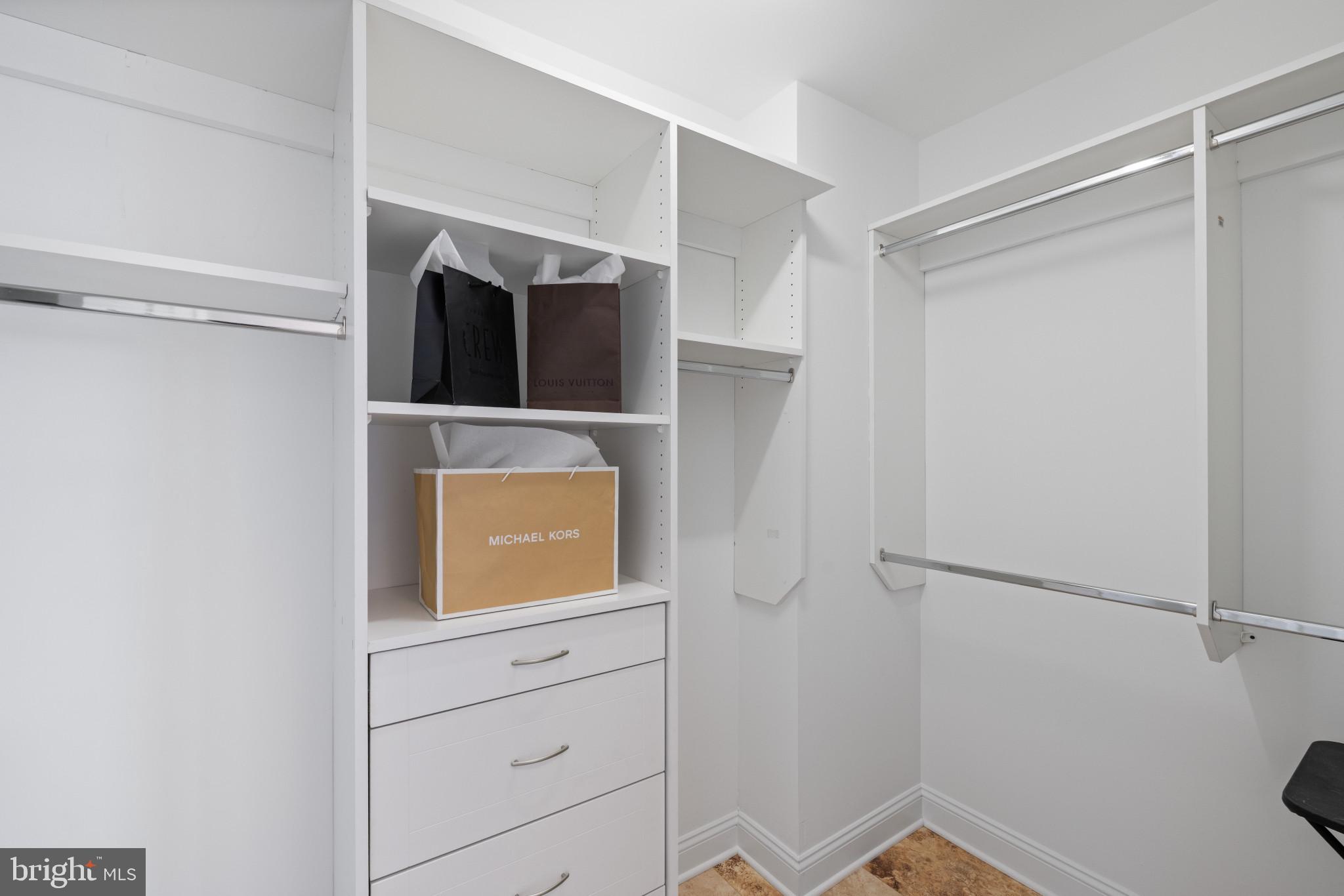 100 Harborview Drive, Unit 910 Baltimore, MD 21230 - Photo 15 of 44 Primary Bedroom walk-in closet #1