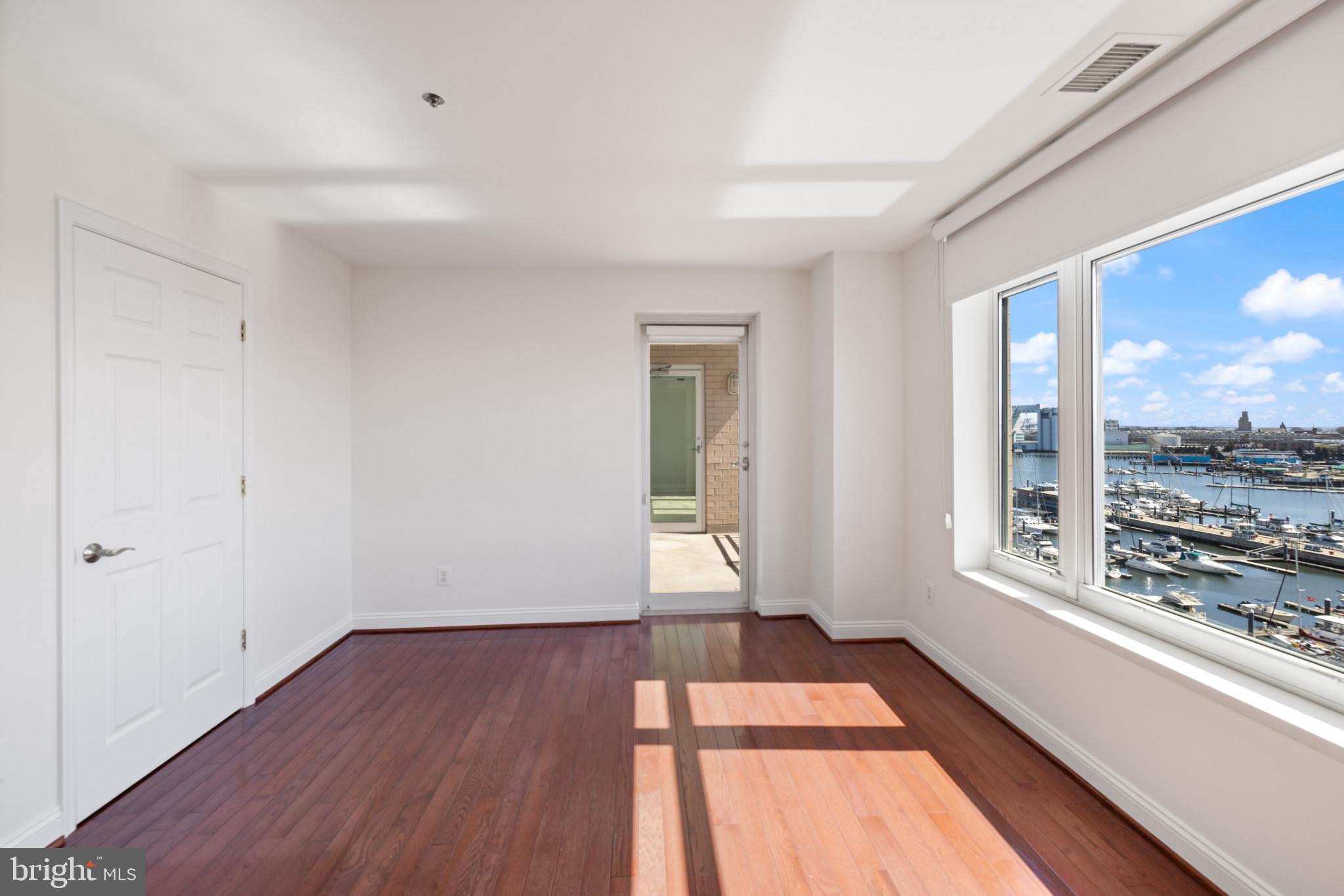 100 Harborview Drive, Unit 910 Baltimore, MD 21230 - Photo 19 of 44 Second Bedroom - unstaged