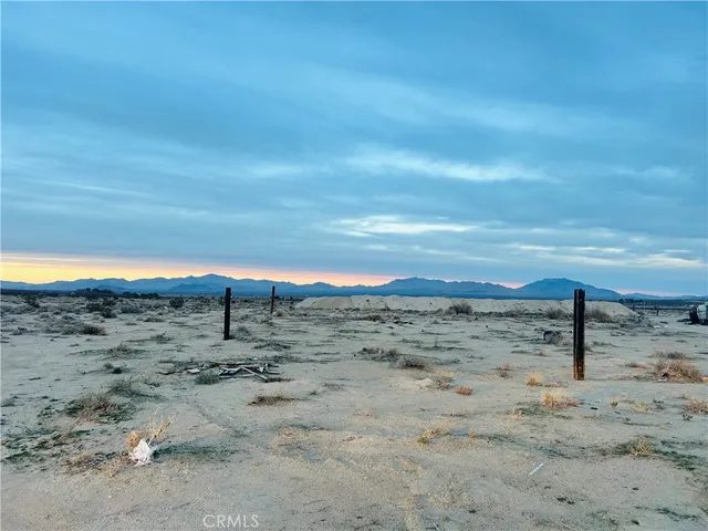 a view of beach and mountain