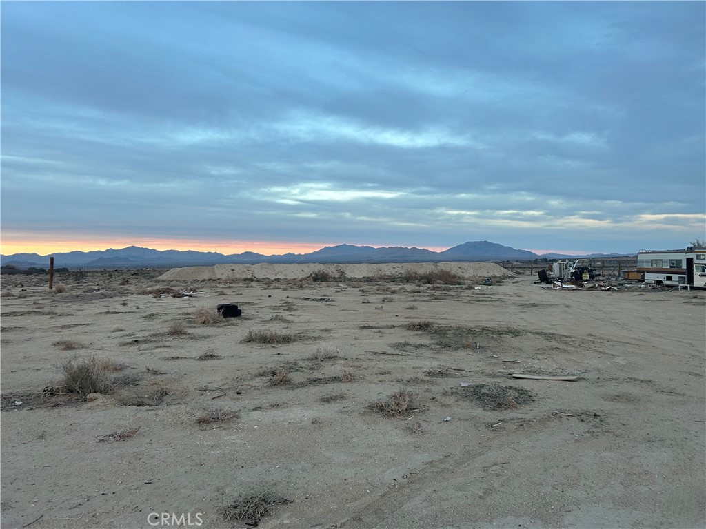36352 Rodeo Road Lucerne Valley, CA 92356 - Photo 6 of 7 a view of a lake with a mountain