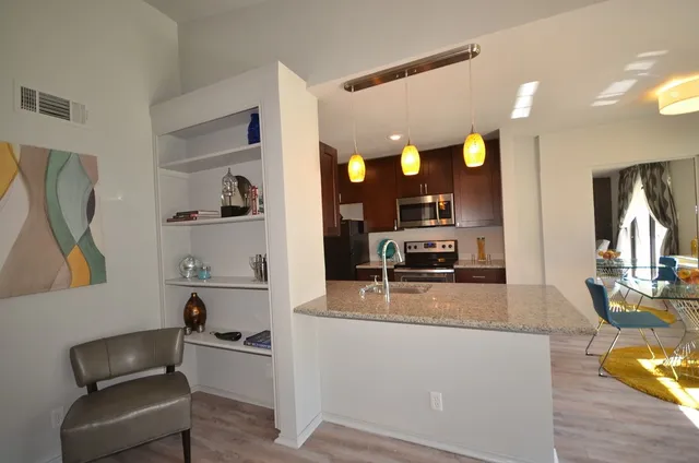 a kitchen with a sink and counter space