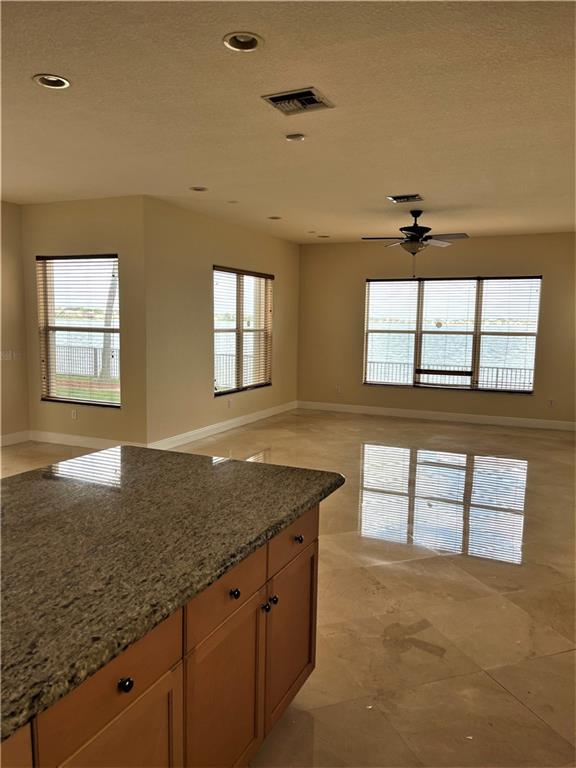 17989 Southwest 54th Street Miramar, FL 33029 - Photo 11 of 53 a view of a kitchen cabinets and a counter top space